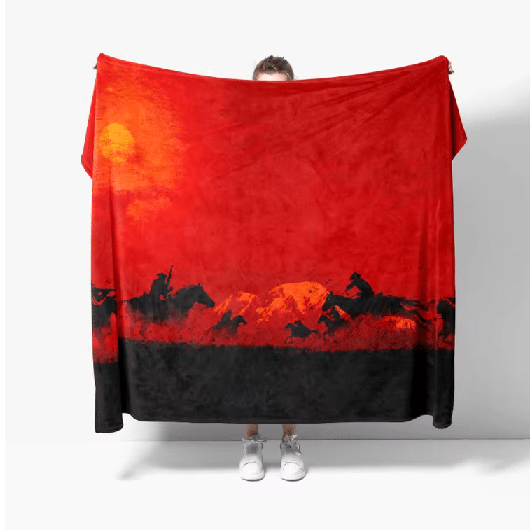 Couverture cowboy rouge et noire motif cavaliers