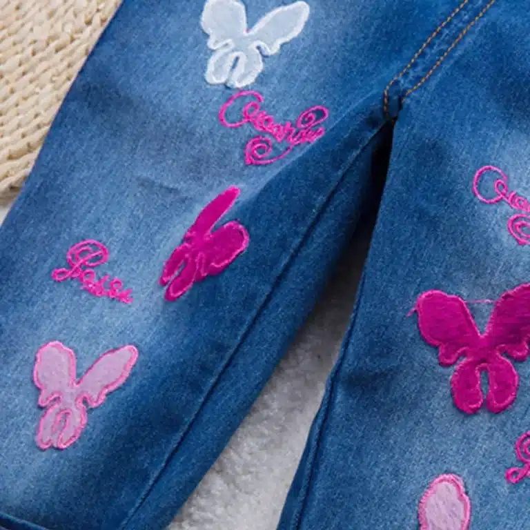 Salopette jean fille bleue nœuds et papillons
