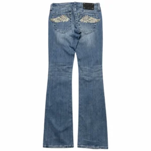 Jean cowboy femme motif d’ailes