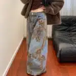 Jean femme vintage années 70 bleu motifs floraux