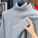 Pull col roulé homme