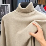 Pull col roulé homme