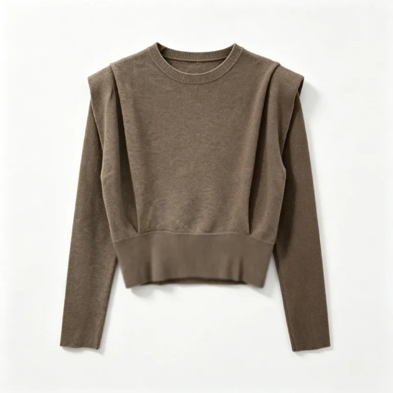 Pull court femme à col rond épaules structurées