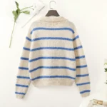 Pull femme vintage blanc à rayures bleues